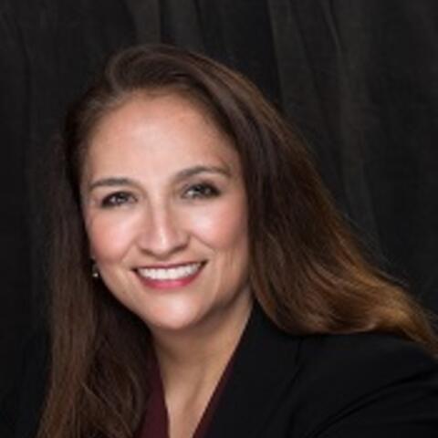 Ruth Barrientos smiling in a portrait